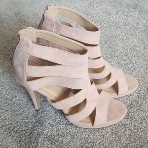 High heels. NEVER BEEN WORN.